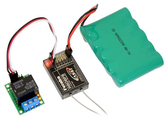 The Pololu RC Switch with Relay connected to a typical RC receiver.