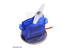 Sub-micro servo 3.7 g on a US quarter for size reference