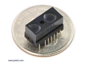 Sharp GP2Y0D805Z0F, GP2Y0D810Z0F, or GP2Y0D815Z0F digital distance sensor on a US quarter for size reference