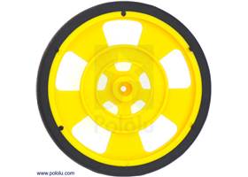 Yellow Solarbotics SW wheel with silicone tire. This view shows the hub designed for standard Futaba servos and the 64-stripe encoder pattern