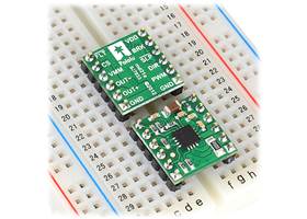DRV8801 single brushed DC motor driver carriers inserted into a solderless breadboard