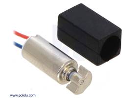 Vibration Motor 11.6x4.6x4.8mm next to the included rubber sleeve