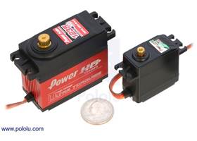 Power HD digital giant servo 1235MG (left) next to a Power HD high-torque standard-size servo 1501MG (right), with a US quarter for size reference