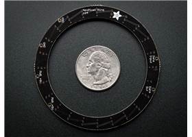 Adafruit 24-LED NeoPixel ring, bottom view with a US quarter for size reference