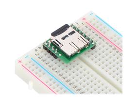 Breakout Board for microSD Card plugged into a breadboard with microSD card (not included) inserted