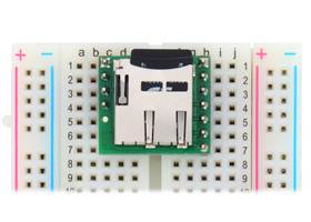 Breakout Board for microSD Card plugged into a breadboard with microSD card (not included) inserted (1)