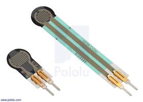 0.25″-diameter short-tail force sensing resistor (FSR) next to a 0.2″-diameter FSR with a standard tail