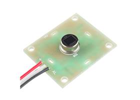 PIR motion sensor with the lens removed, revealing the sensing elements beneath