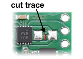 Step one of enabling current limiting on the MAX14870 Single Brushed DC Motor Driver Carrier: cut trace between 1206 resistor pads
