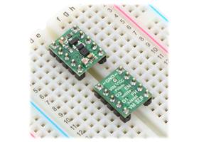 Two DRV8838 Single Brushed DC Motor Driver Carriers plugged into a breadboard