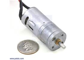 Dagu Wild Thumper all-terrain chassis gearmotor with US quarter for size reference.