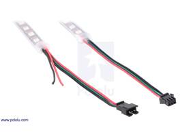 The connectors and power wires for addressable LED strips.  On the left is the input end of the strip and on the right is the output end.