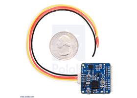 UM7-LT orientation sensor with included cable and U.S. quarter for size reference.