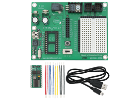 The Board of Education development board (USB), Basic Stamp 2, and USB A to mini-B cable included in the Boe-Bot Robot Kit.