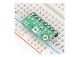 LPS25H/LPS25HB pressure/altitude sensor carrier with voltage regulator in a breadboard.