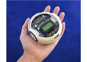 3pi+ 32U4 Robot fits in the palm of a hand.