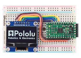 Graphical OLED Display: 128&#215;64, 1.3&quot;, White, SPI, controlled by an A-Star 328PB Micro running at 3.3V.