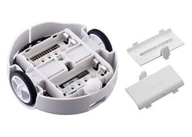 3pi+ 32U4 OLED Robot, bottom view showing the insides of the battery compartments.