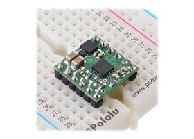 DRV8256E/P Single Brushed DC Motor Driver Carrier in a breadboard.