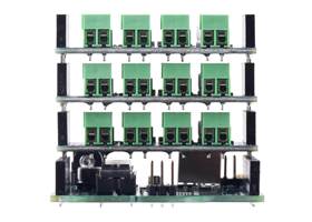 Three Motoron M3S256 or M3S550 shields attached to an Arduino Uno, showing the spacing of the 3.5 mm terminal blocks.