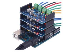 Three Motoron M3S550 shields being controlled by an Arduino Uno.