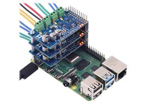 Three Motoron M3H550 controllers being controlled by a Raspberry Pi.
