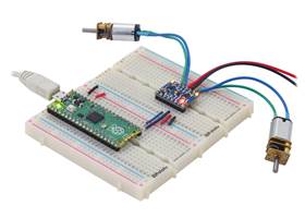 A Raspberry Pi Pico on a breadboard using a Motoron M2T550/M2U550 Dual Motor Controller to control two motors.