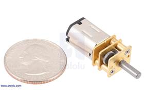 Micro Metal Gearmotor next to a US quarter dollar for size reference.