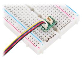 Pololu I²C Isolator with Connectors, ISO1640, with a cable connection to one side and a breadboard connection to the other (cable and headers not included).
