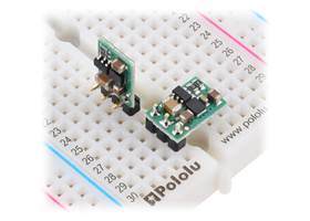 D45V5Fx step-down voltage regulators, soldered with straight and right-angle headers (not included), on a breadboard.