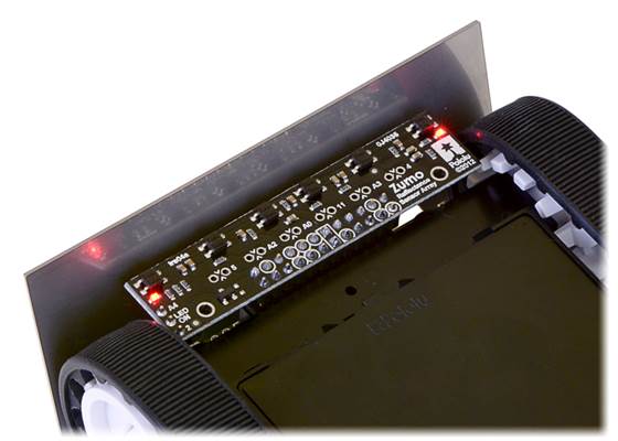 Zumo reflectance sensor array on a Zumo robot, bottom view.