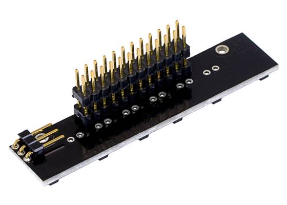 Zumo reflectance sensor array assembled with included male header pins.