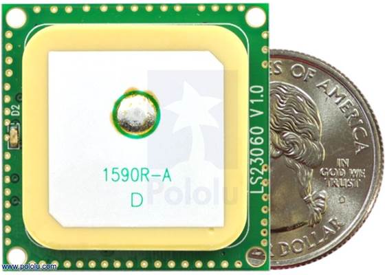 LS20031 GPS receiver module top view with quarter for size reference.