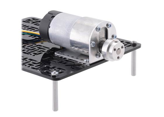 The machined piece of the 6&nbsp;mm scooter wheel adapter mounted to the output shaft of a 37D&nbsp;mm gearmotor.