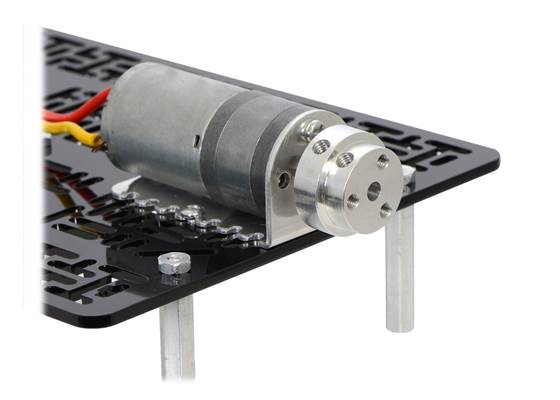 The machined piece of the 4&nbsp;mm scooter wheel adapter mounted to the output shaft of a 25D&nbsp;mm gearmotor.