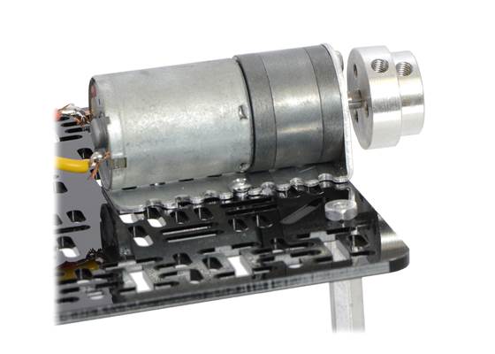 The machined piece of the 4&nbsp;mm scooter wheel adapter mounted to the output shaft of a 25D&nbsp;mm gearmotor. (1)