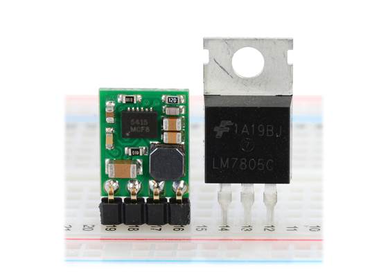Pololu step-down voltage regulator D24V5Fx next to a 7805 voltage regulator in TO-220 package.