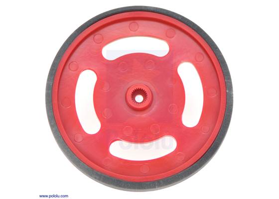 Red Futaba servo wheel with included rubber band tire.  This view shows the hub designed for Futaba servo splines.