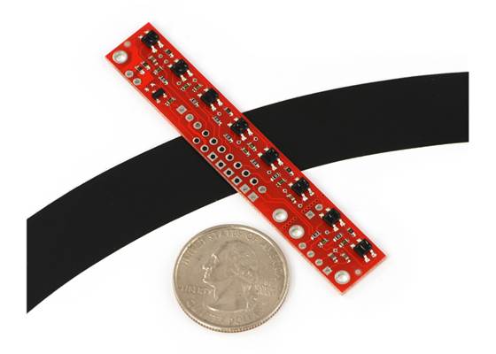 QTR-8A reflectance sensor array on a 3/4&quot; line with a quarter for size reference.