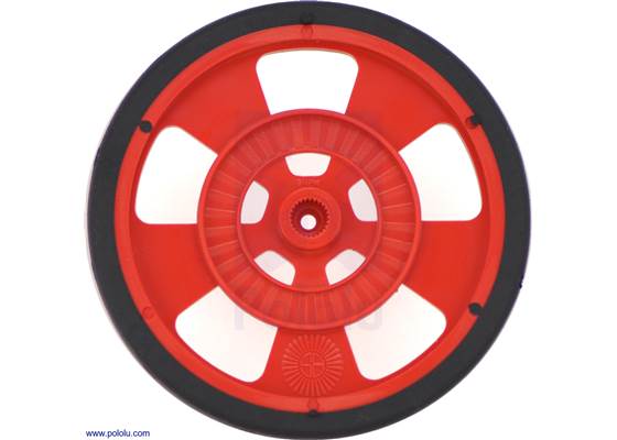 Red Solarbotics SW wheel with silicone tire. This view shows the hub designed for standard Futaba servos and the 64-stripe encoder pattern.