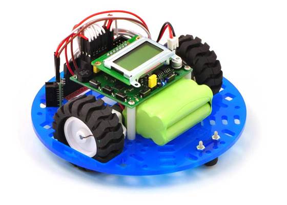 Pololu 5&quot; round robot chassis RRC04A with a QTR sensor array and a Sharp digital distance sensor.