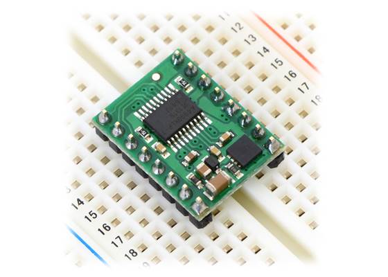 A4990 dual motor driver carrier inserted into a solderless breadboard.