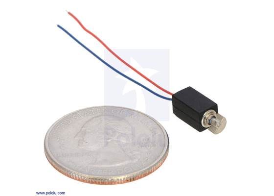 Vibration Motor 11.6x4.6x4.8mm next to a US quarter for size reference.