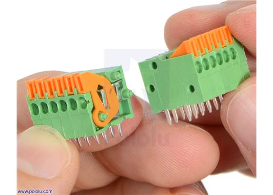 Attatching another screwless terminal block to the first in place of the now-removed end cap.