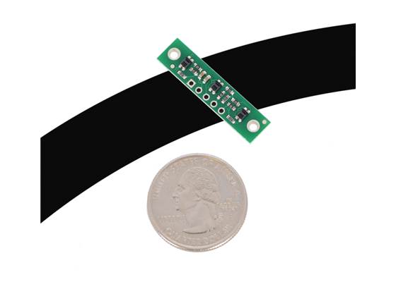 QTR-3A or QTR-3RC reflectance sensor array on a 3/4&quot; line with a quarter for size reference.