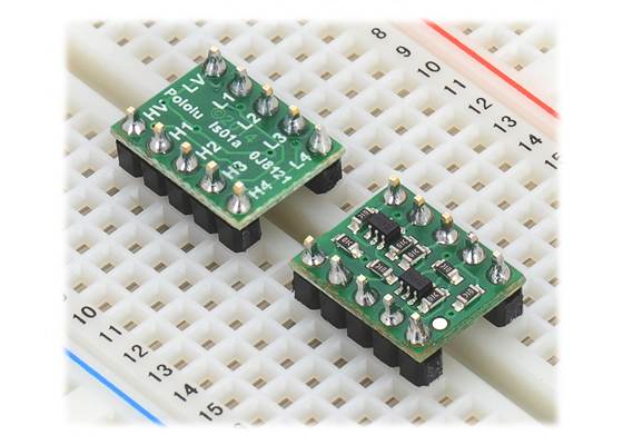 Logic level shifters in breadboard, one soldered label-side up and the other soldered component-side up.