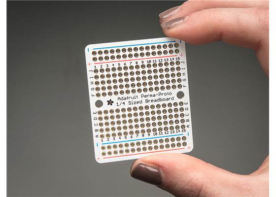 Adafruit Perma-Proto Quarter-Sized Breadboard PCB.