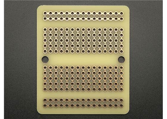 Adafruit Perma-Proto Quarter-Sized Breadboard PCB, bottom view.