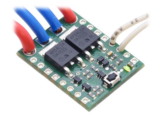 Big Pushbutton Power Switch with Reverse Voltage Protection, assembled with wires soldered directly to the board.