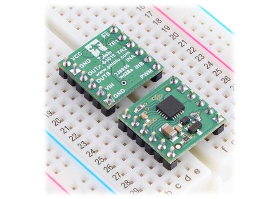 Two BD65496MUV Single Brushed DC Motor Driver Carriers plugged into a breadboard.